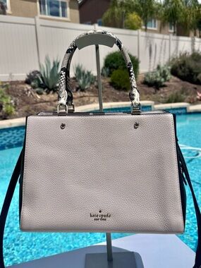 Kate Spade Leila satchel with snake trim and handles